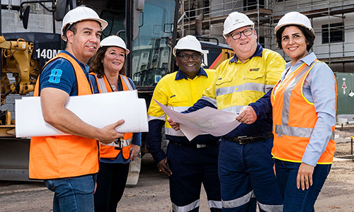 Workers discussing project